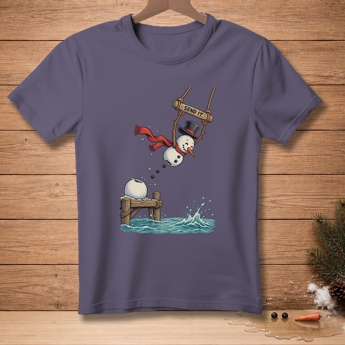 Snowman on a swing saying "SEND IT." jumping into water.