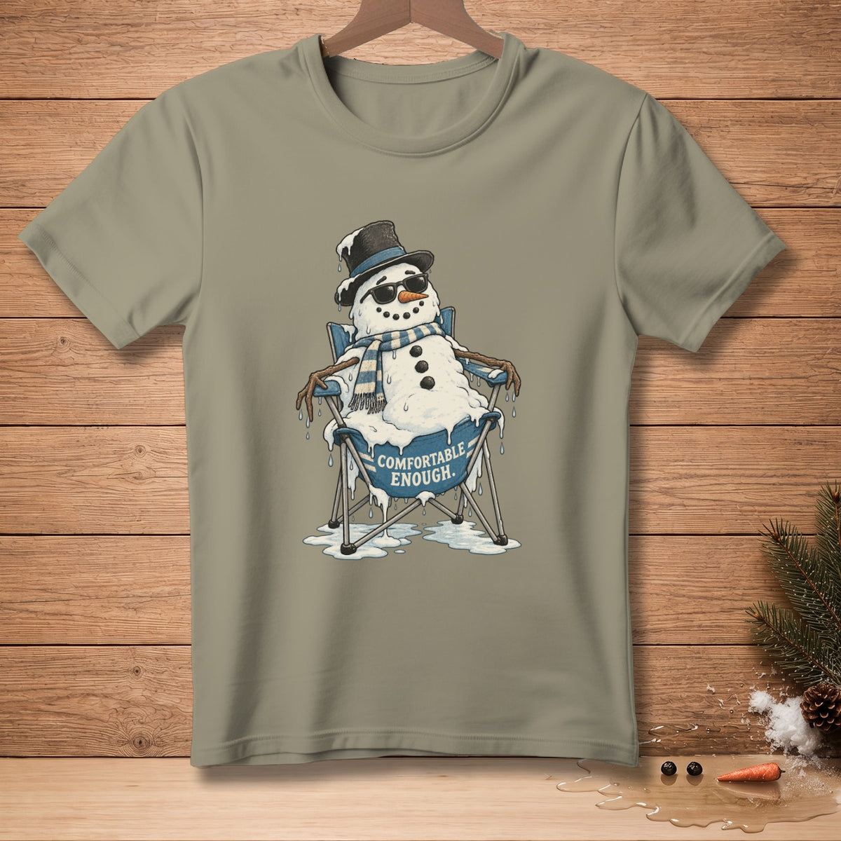 Melting snowman wearing sunglasses and scarf sits in a chair with "Comfortable Enough" text.