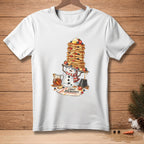 Snowman carrying a tall stack of pancakes with text "Light Breakfast".