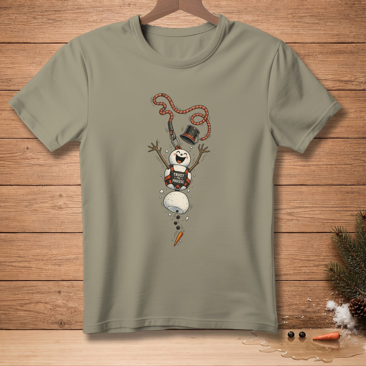 T-shirt with a melting snowman illustration and "Trust the process" text.