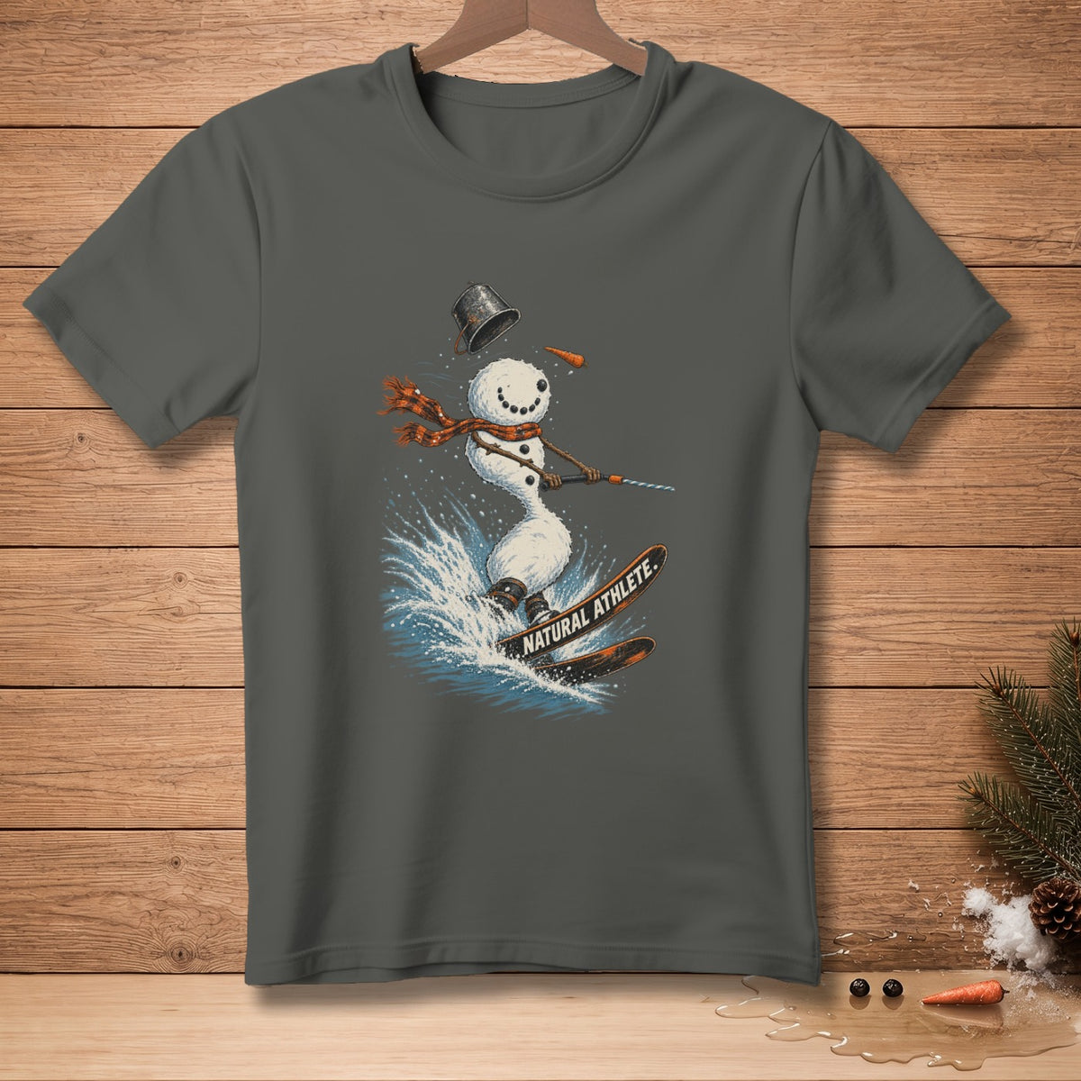 Snowman waterskiing with text "NATURAL ATHLETE." on skis.