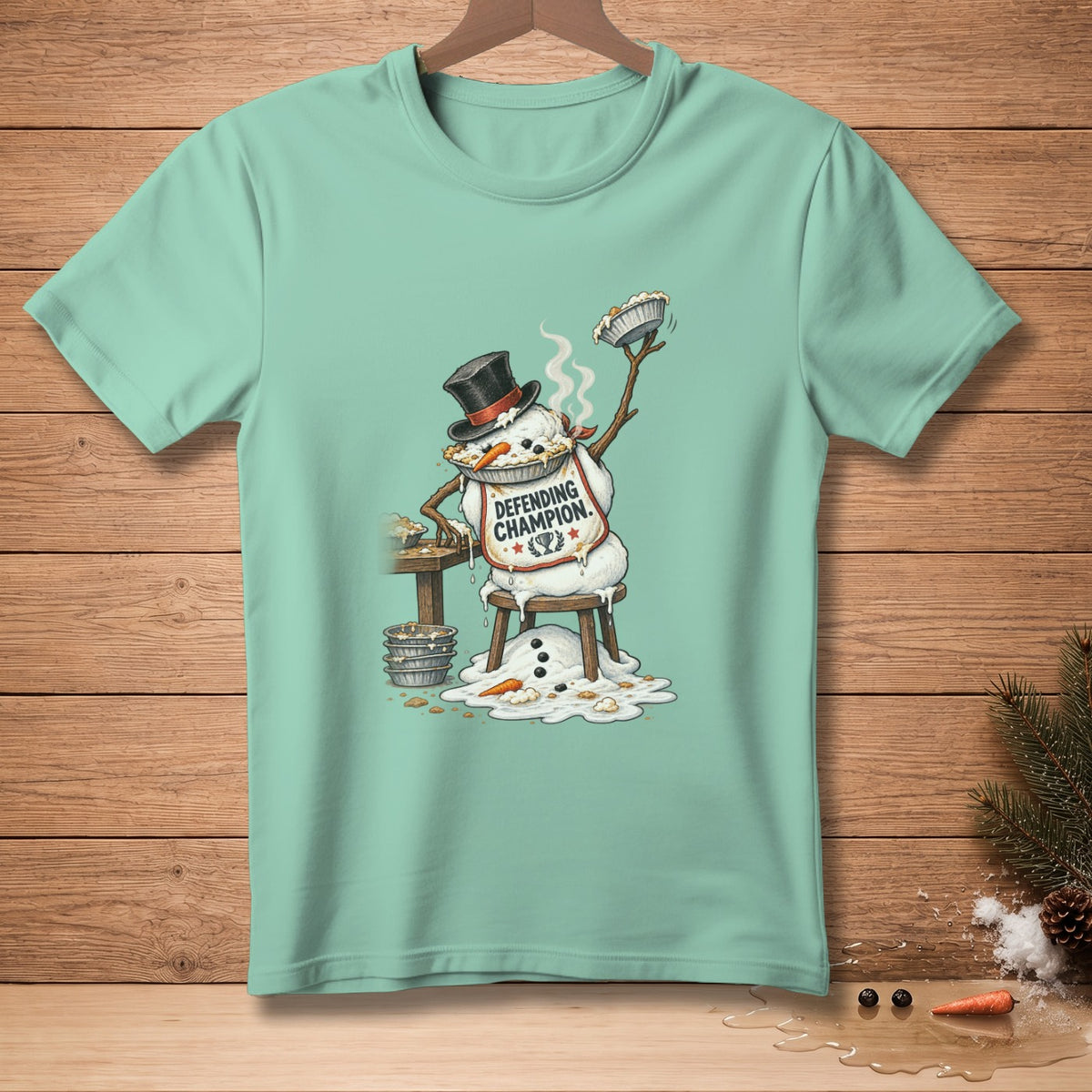 Snowman in top hat and apron holding pie, "Defending Champion."