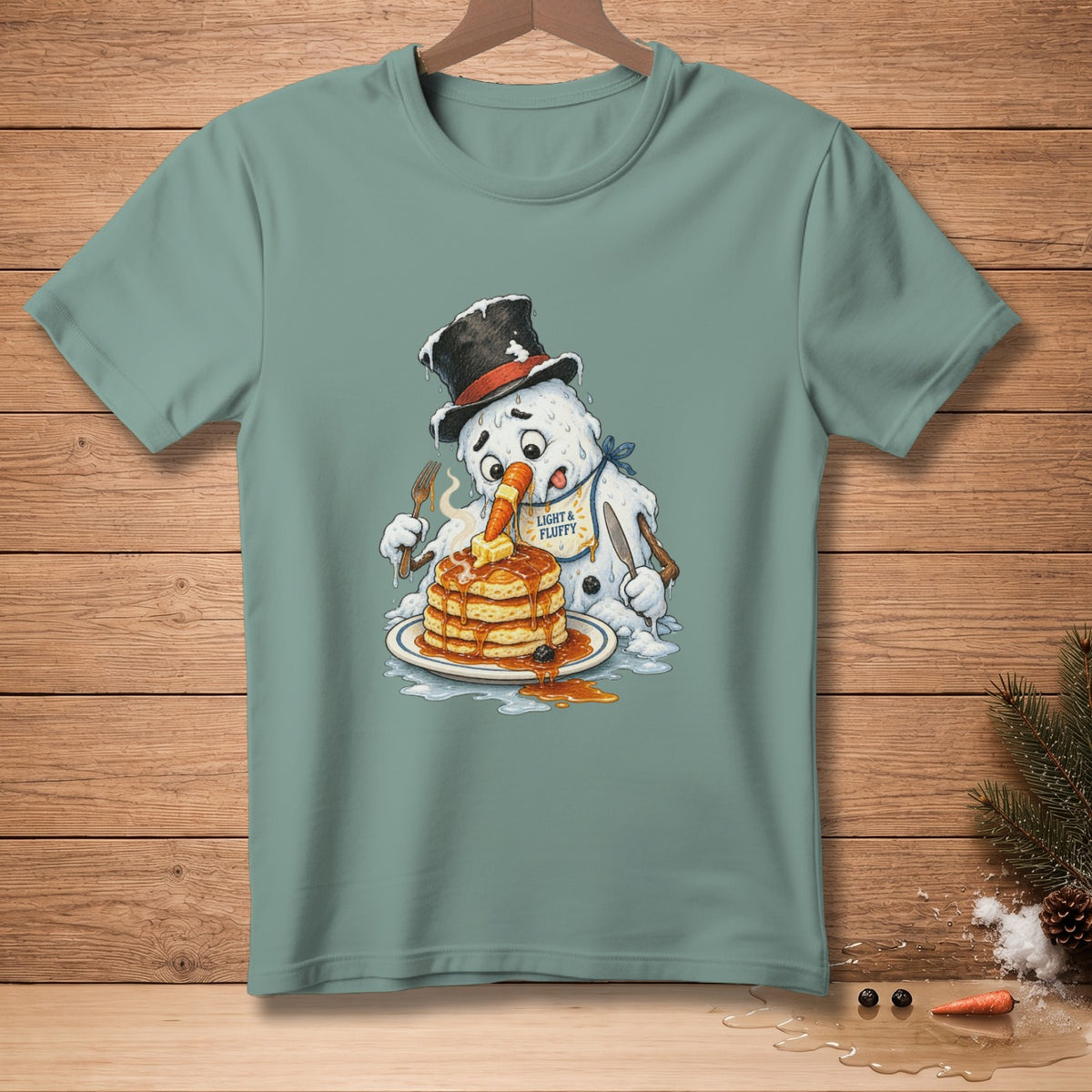 Melting snowman in top hat eats pancakes with "Light & Fluffy" bib.