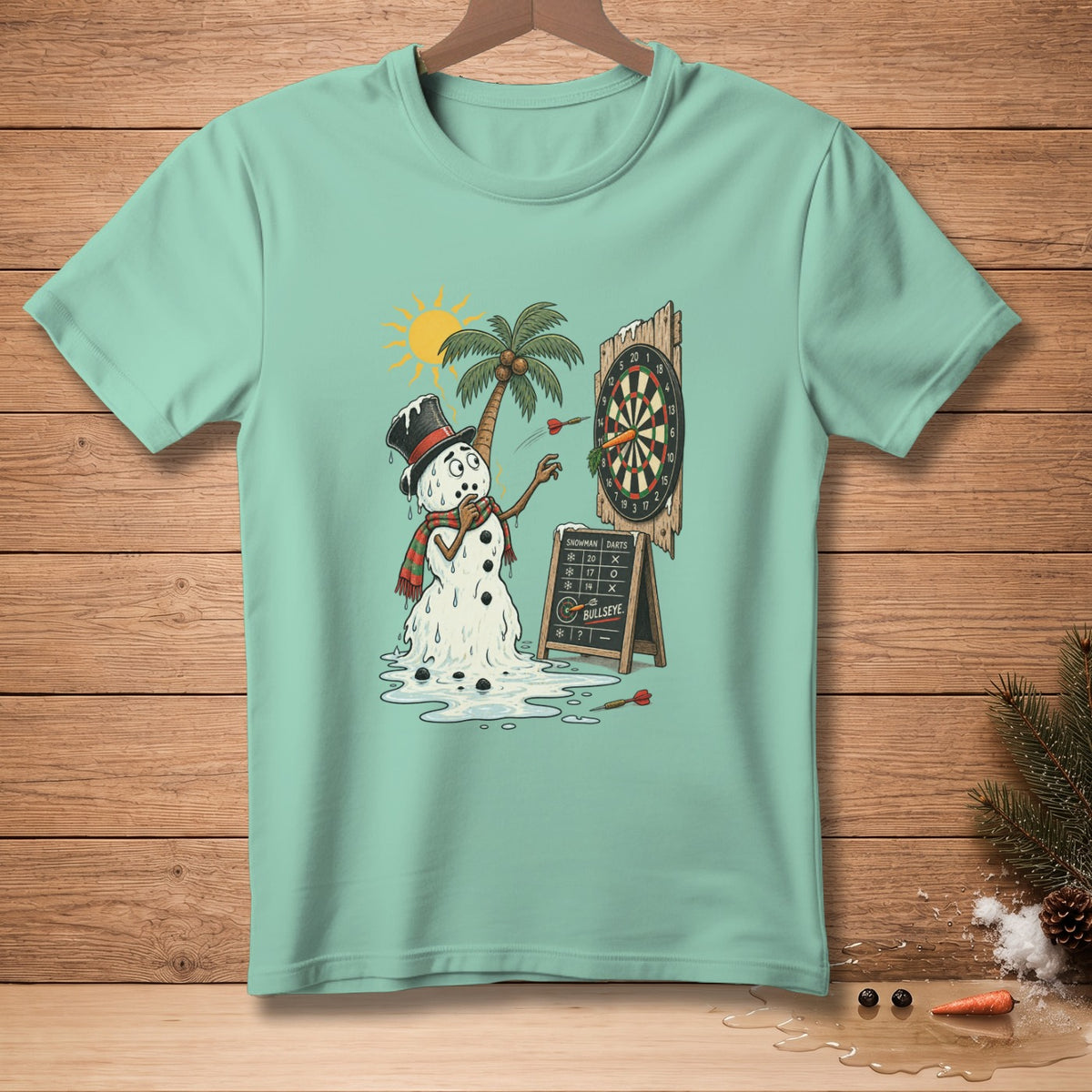Mint t-shirt with melting snowman playing darts under a palm tree.