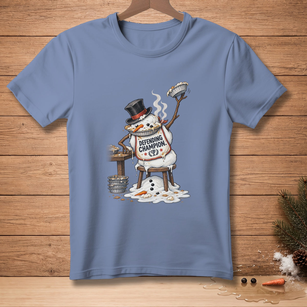 Snowman in top hat with pie, wearing "DEFENDING CHAMPION" bib.