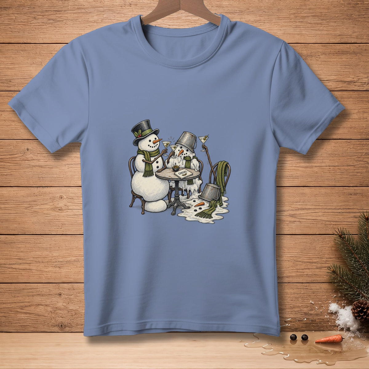 Two melting snowmen with hats and scarves toast with martinis at a table.