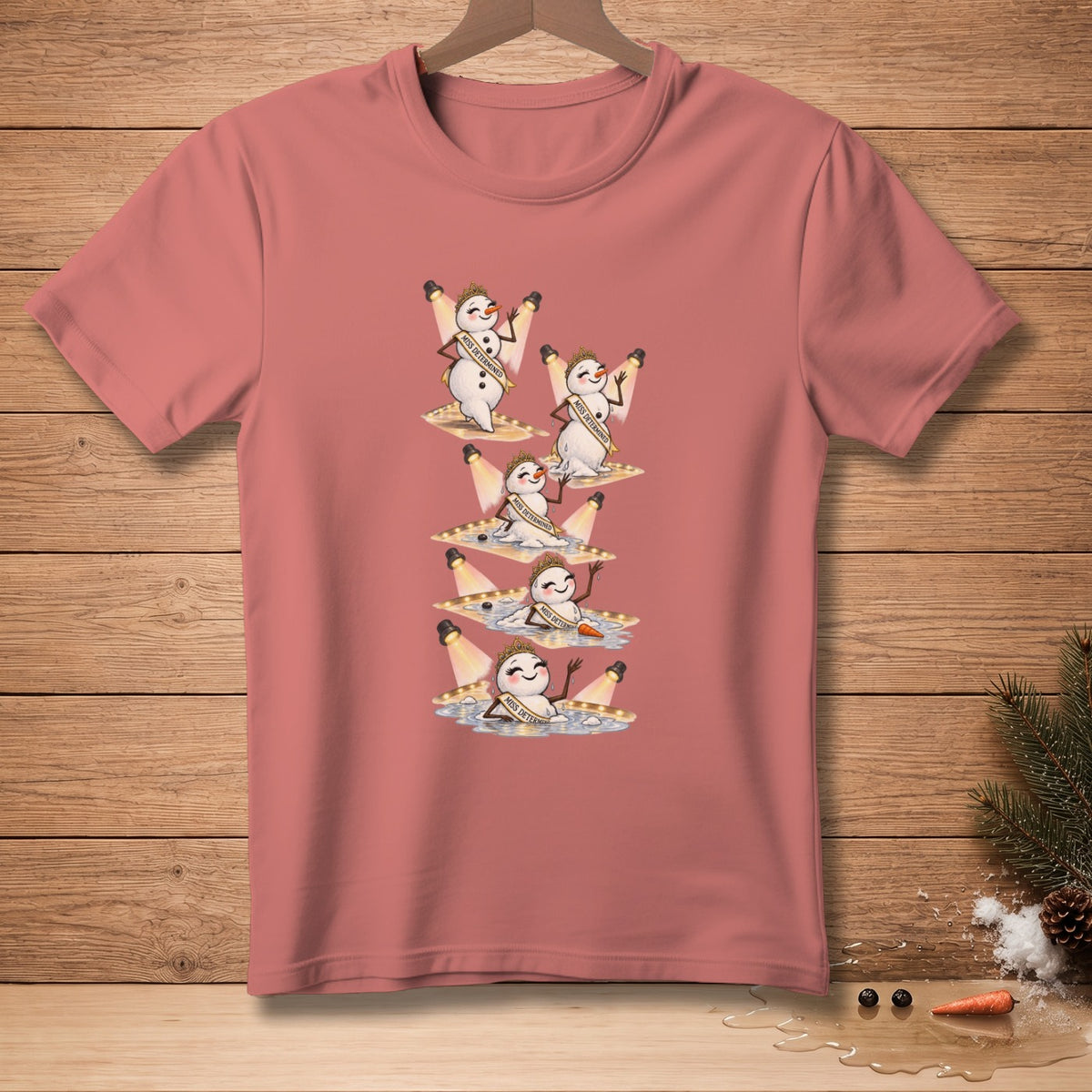 T-shirt with melting snowmen wearing crowns and "Miss Determined" sashes.