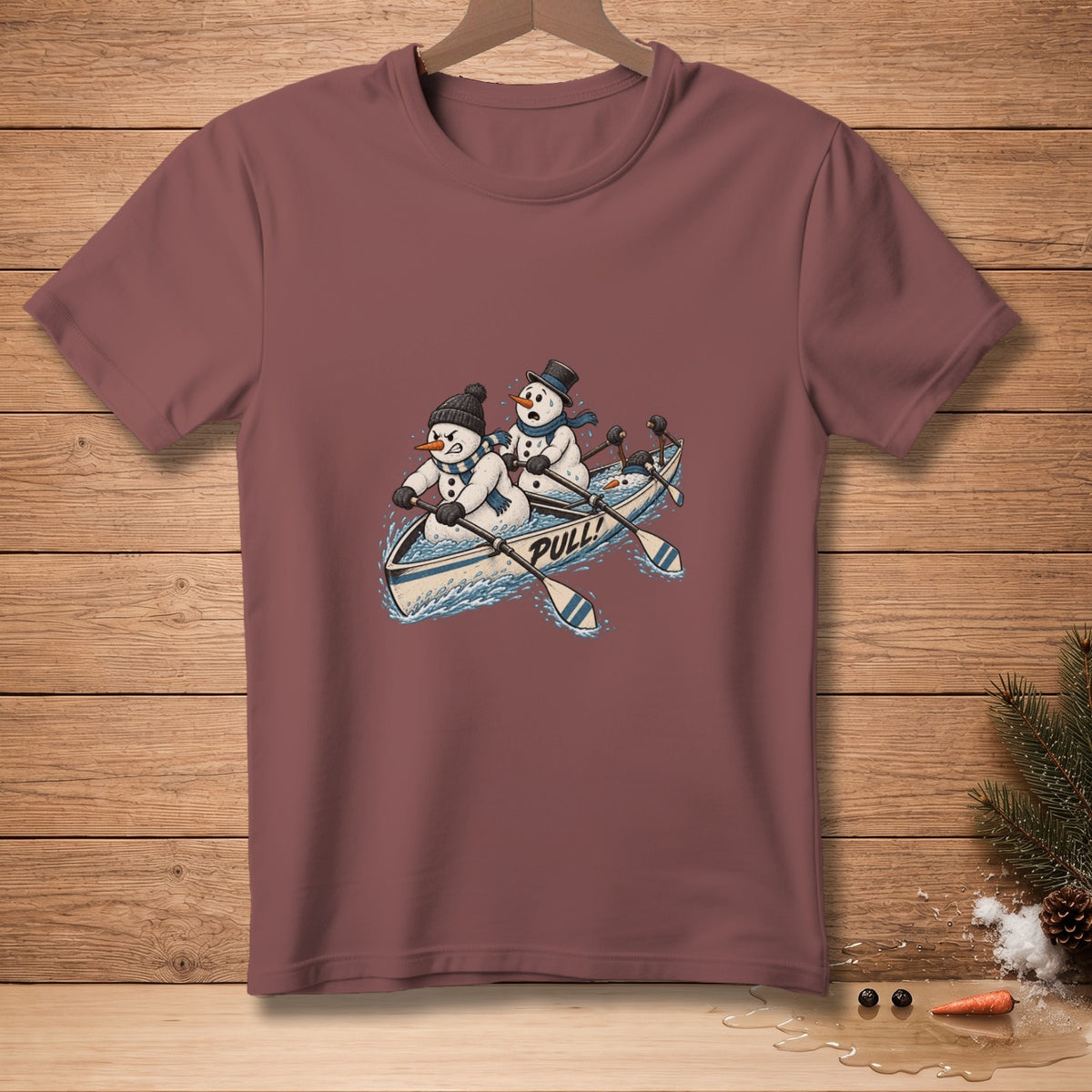 T-shirt with cartoon snowmen rowing a boat and the word "PULL!".