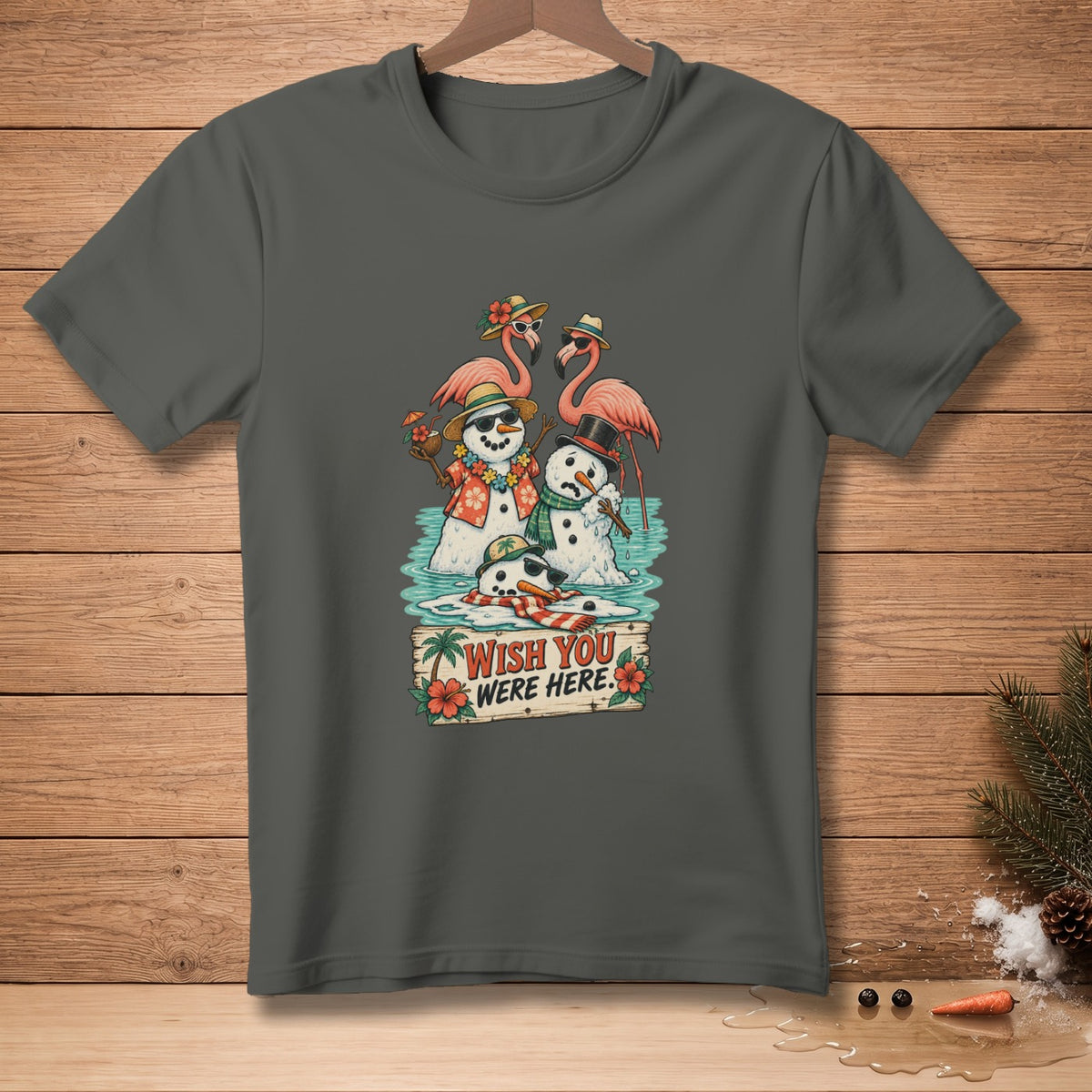 Snowmen and flamingos in water with a "Wish You Were Here" sign.
