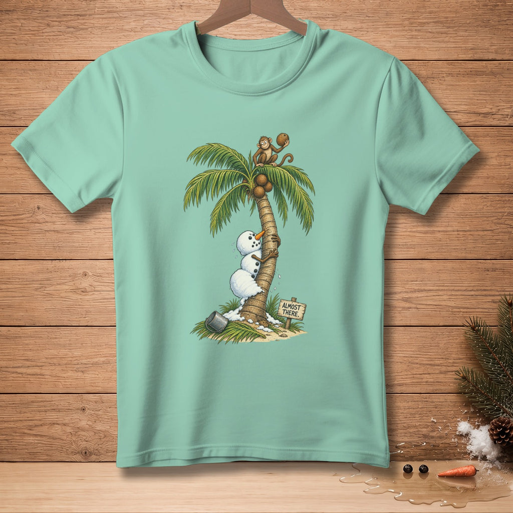 Cartoon of a monkey and snowmen on a palm tree with a sign that reads "Almost There."