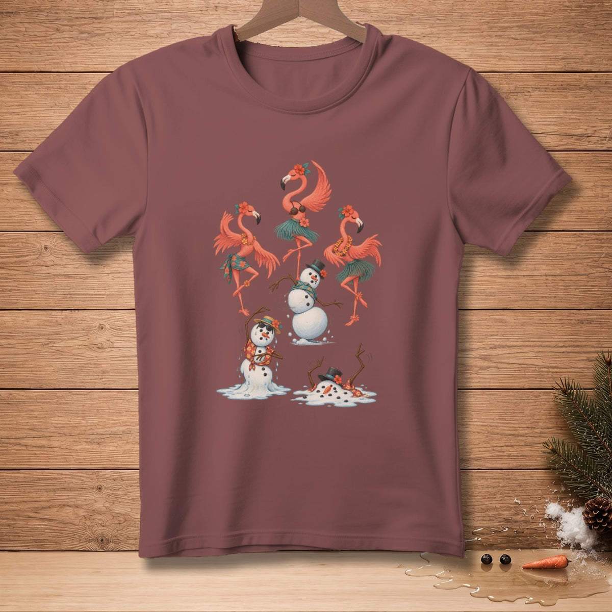 T-shirt with cartoon flamingos and snowmen in tropical attire.