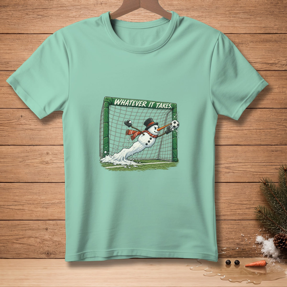 Snowman soccer player dives for the ball in front of a net with text "WHATEVER IT TAKES."