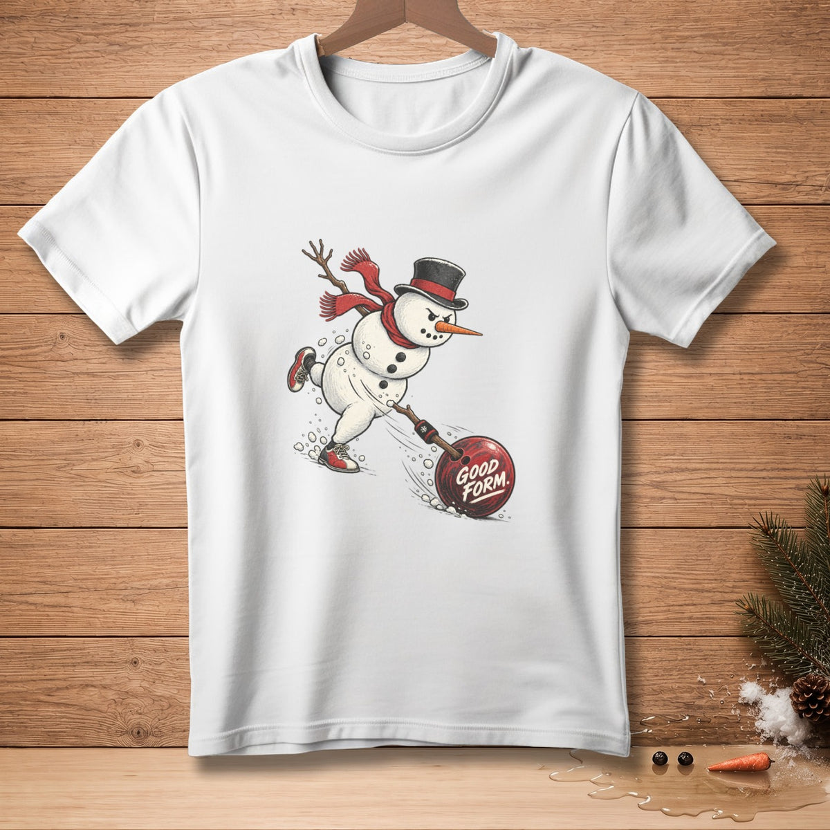White t-shirt with a cartoon snowman bowling a red ball labeled "GOOD FORM".