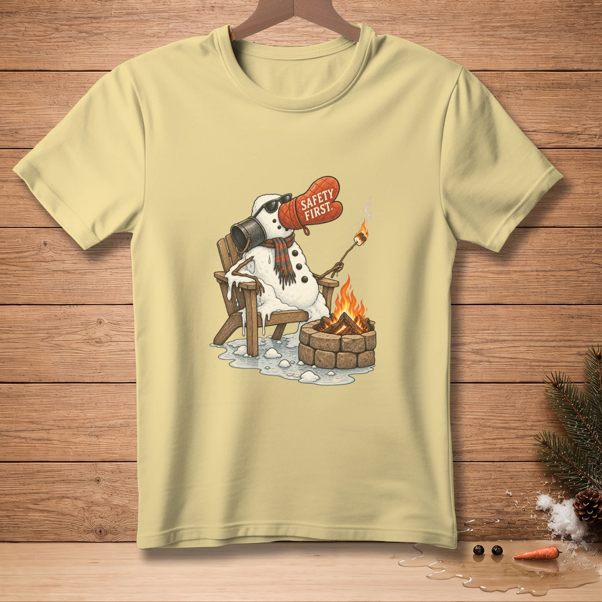 Snowman melting by campfire wearing "Safety First" oven mitt and sunglasses.