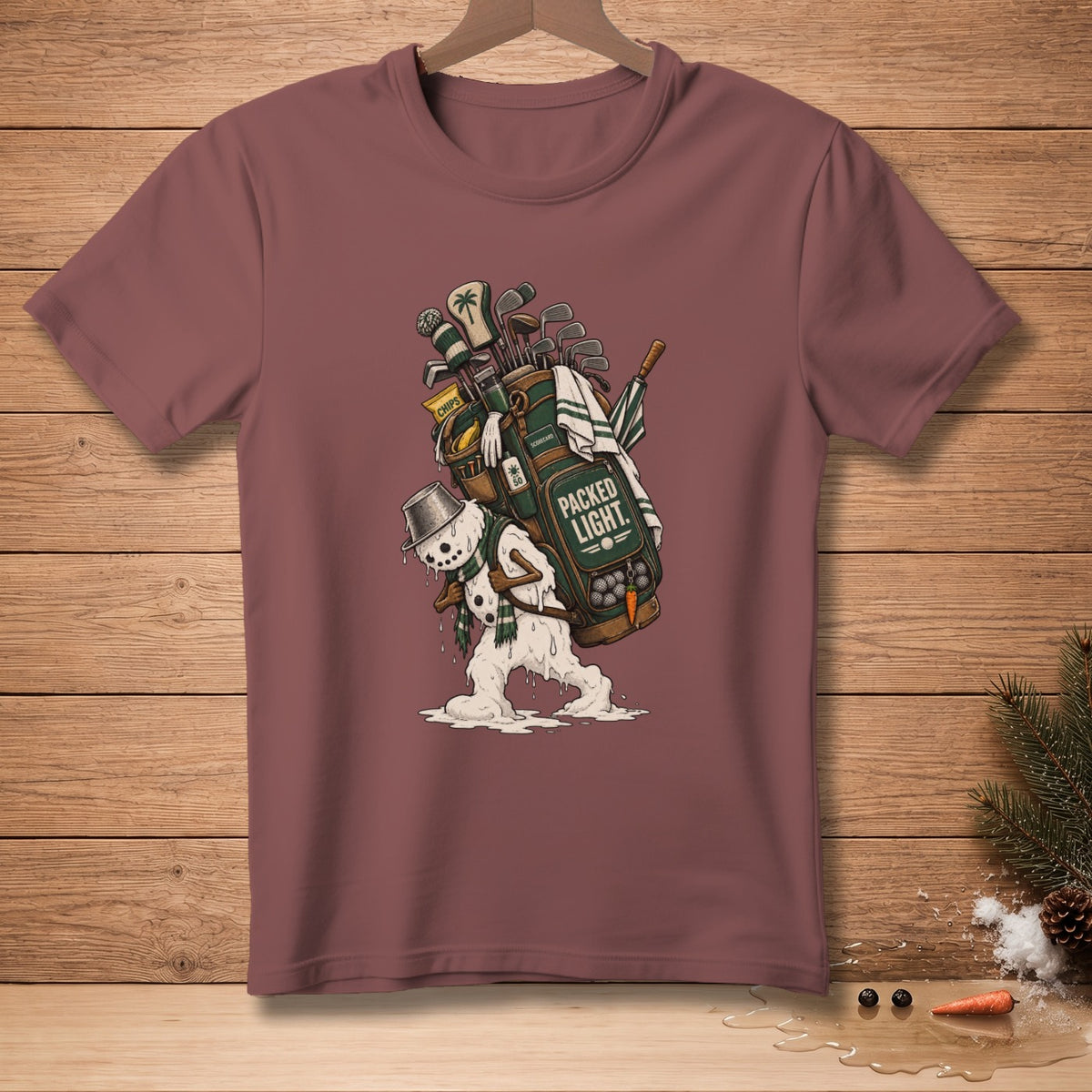 Melting snowman carrying a golf bag with "PACKED LIGHT." text.