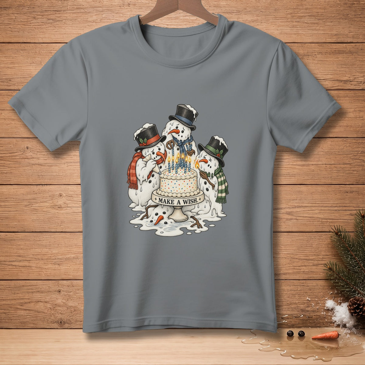 Melting snowmen with hats and scarves gather around a birthday cake.