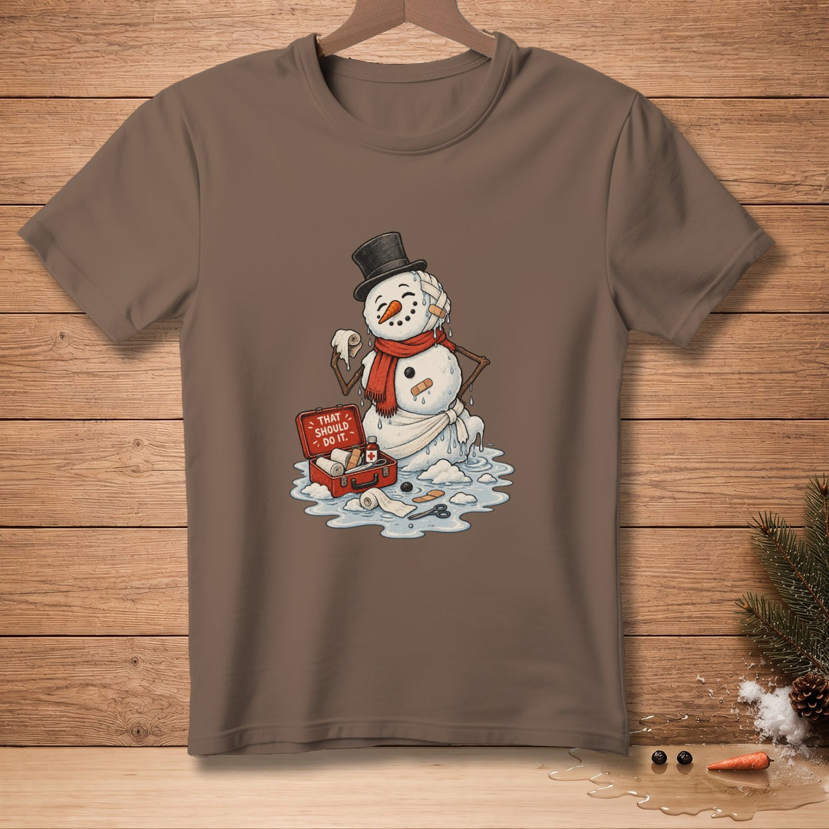 Melting snowman with a first aid kit and text "THAT SHOULD DO IT."