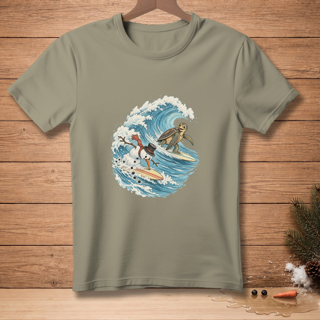 Snowman and turtle surfing on waves on a tan t-shirt.