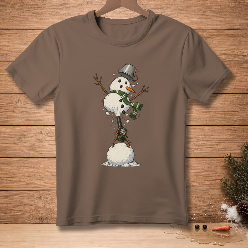 Brown t-shirt with illustration of a snowman using a leaf blower on a snowball.