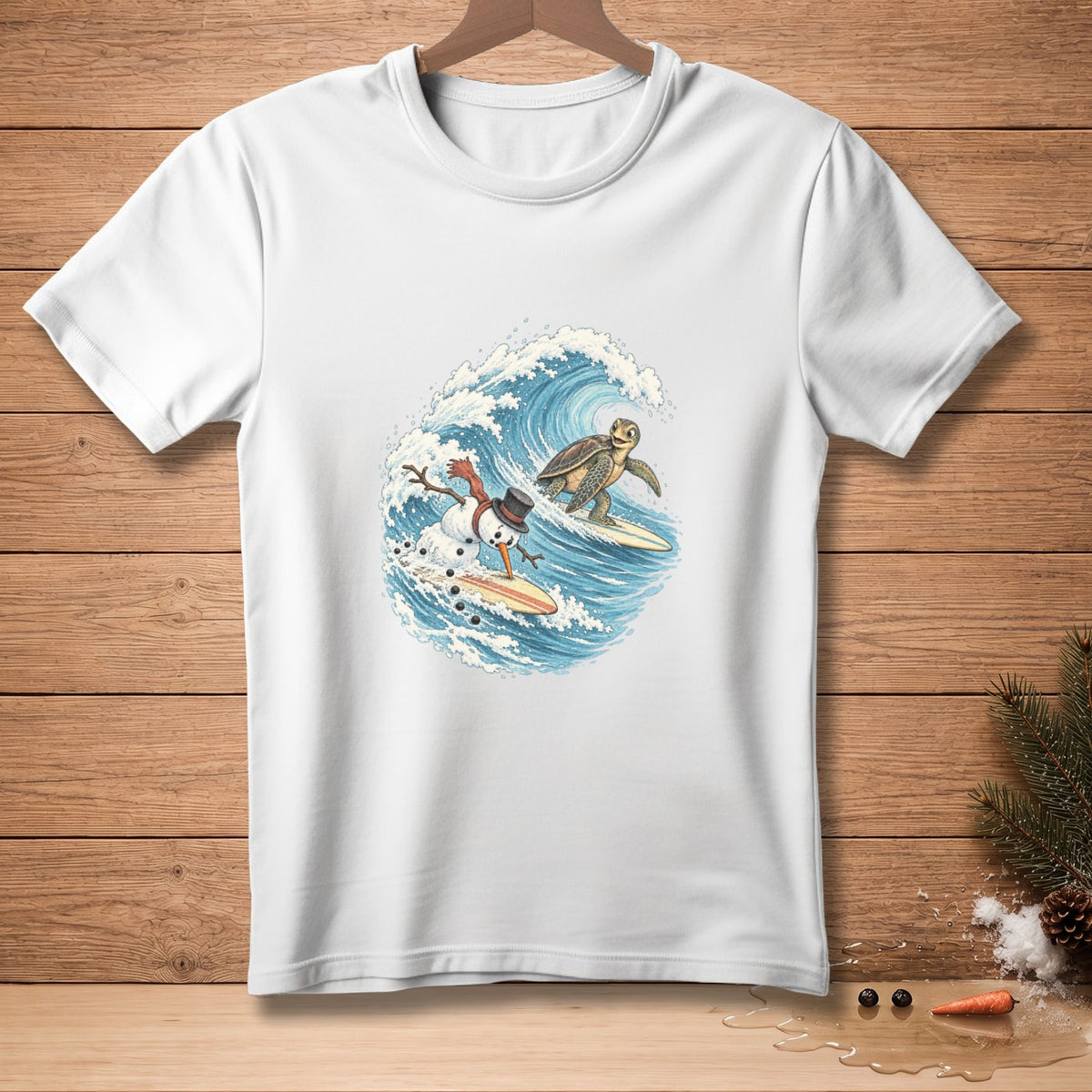White t-shirt with a snowman and turtle surfing on a large ocean wave.