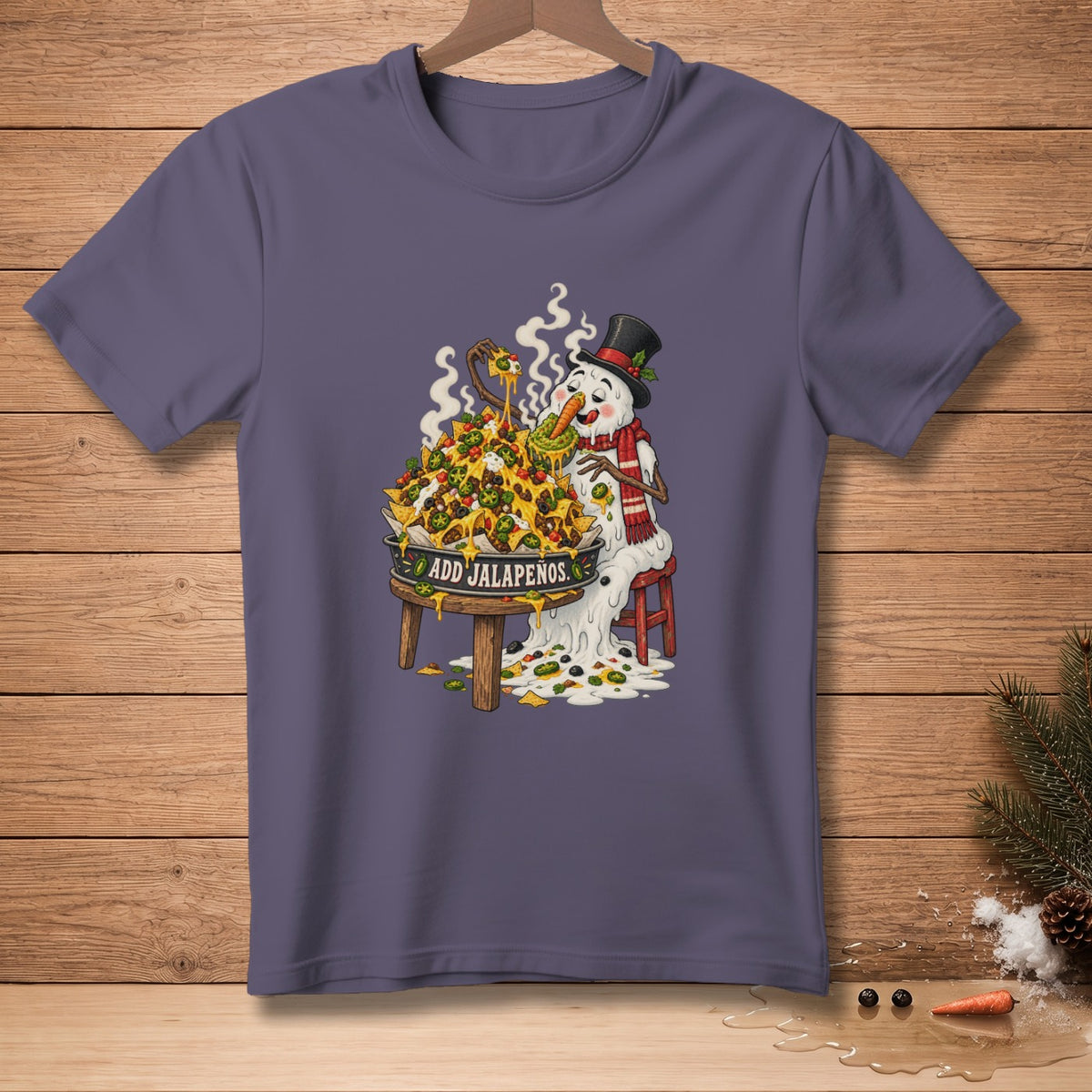 Snowman eating nachos with text "ADD JALAPENOS" on a purple t-shirt.