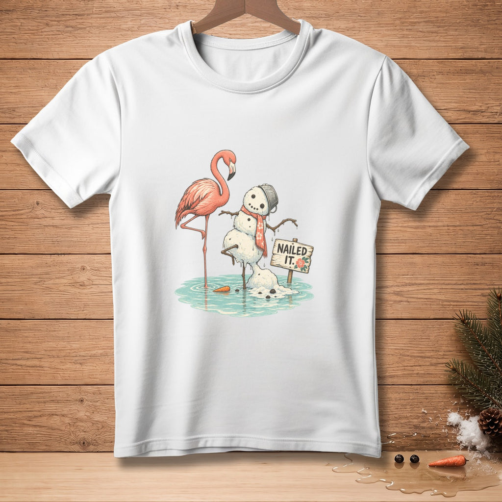 Flamingo with melting snowman and "NAILED IT." sign on white t-shirt.