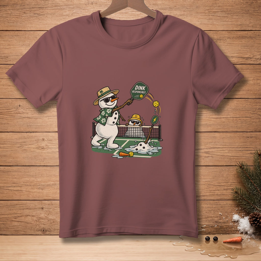 Snowmen playing pickleball with text "DINK RESPONSIBLY" on a dark pink shirt.