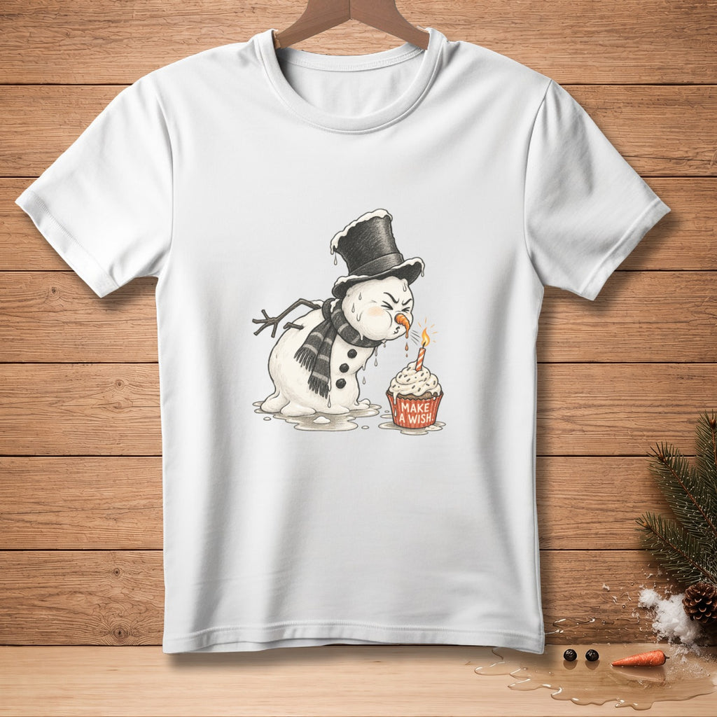 Melting snowman in top hat and scarf blows out birthday candle on cupcake with "Make a Wish".