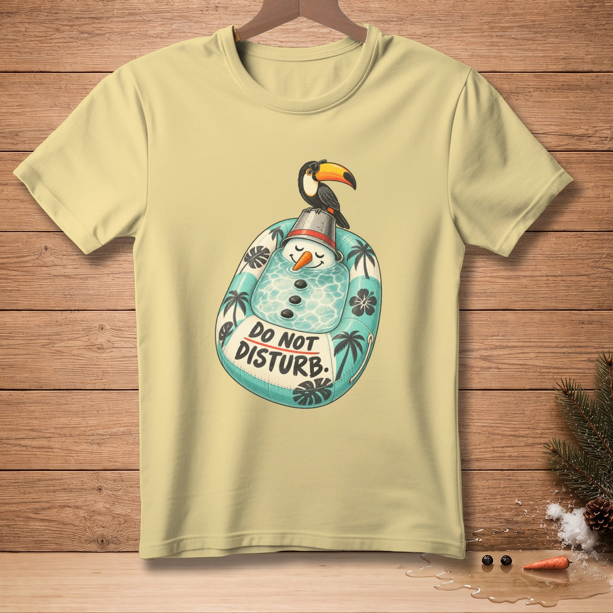 T-shirt with graphic of snowman in inner tube, toucan, and text "DO NOT DISTURB."