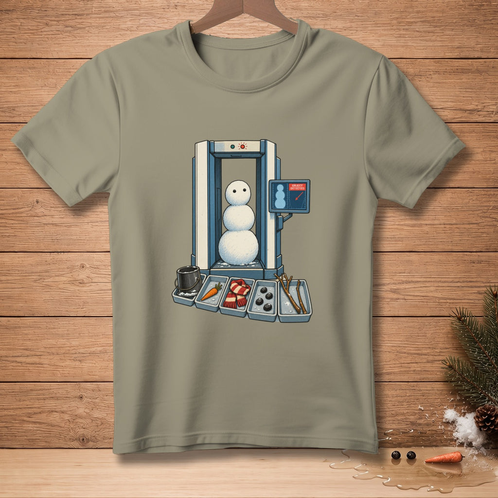 Snowman going through security screening with detected object on screen.