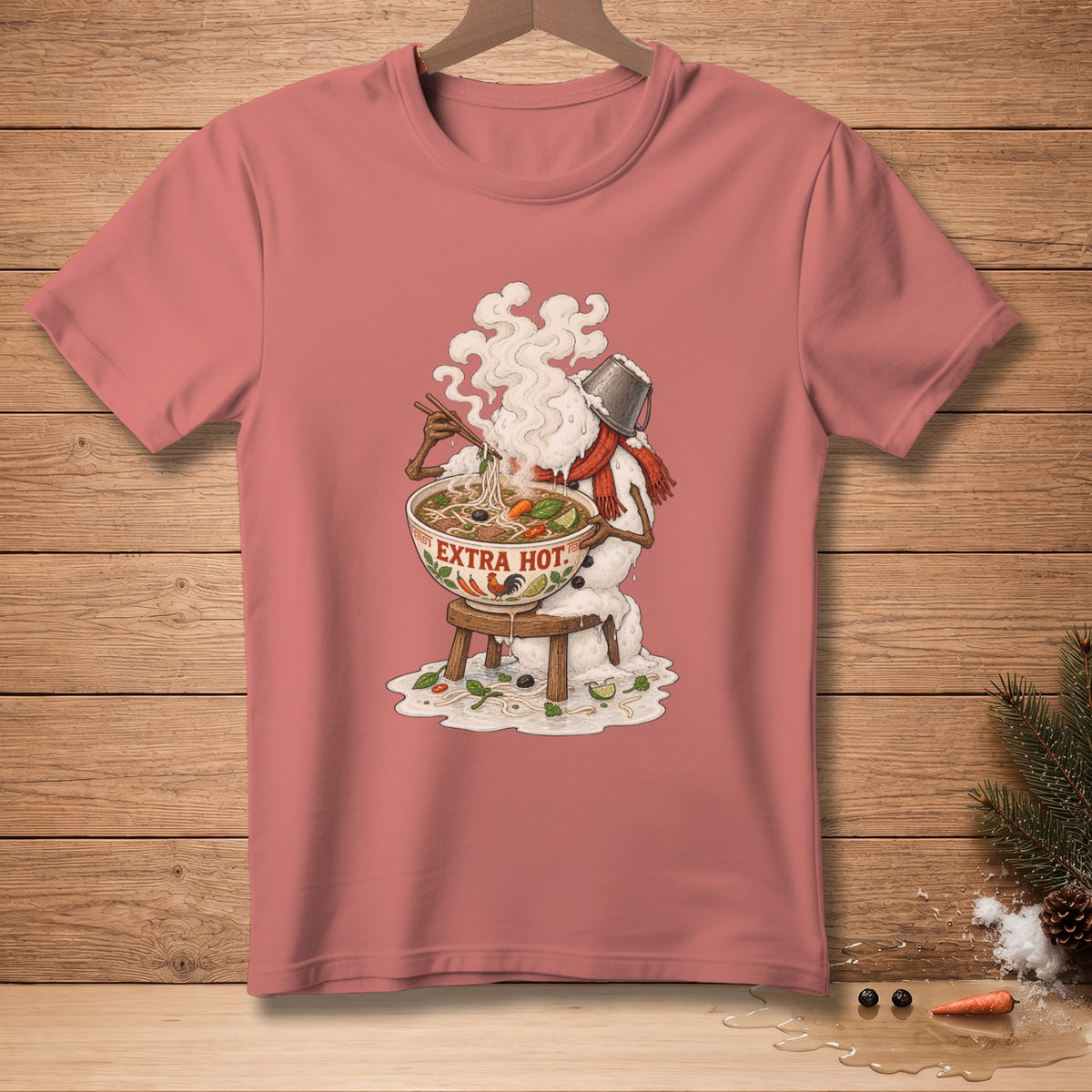 T-shirt with snowman eating steaming bowl of pho, text reads "Extra Hot."