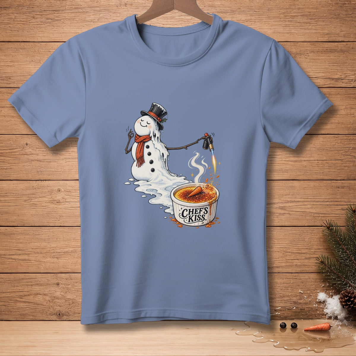Melting snowman in a top hat torching creme brulee with "Chef's Kiss" text.