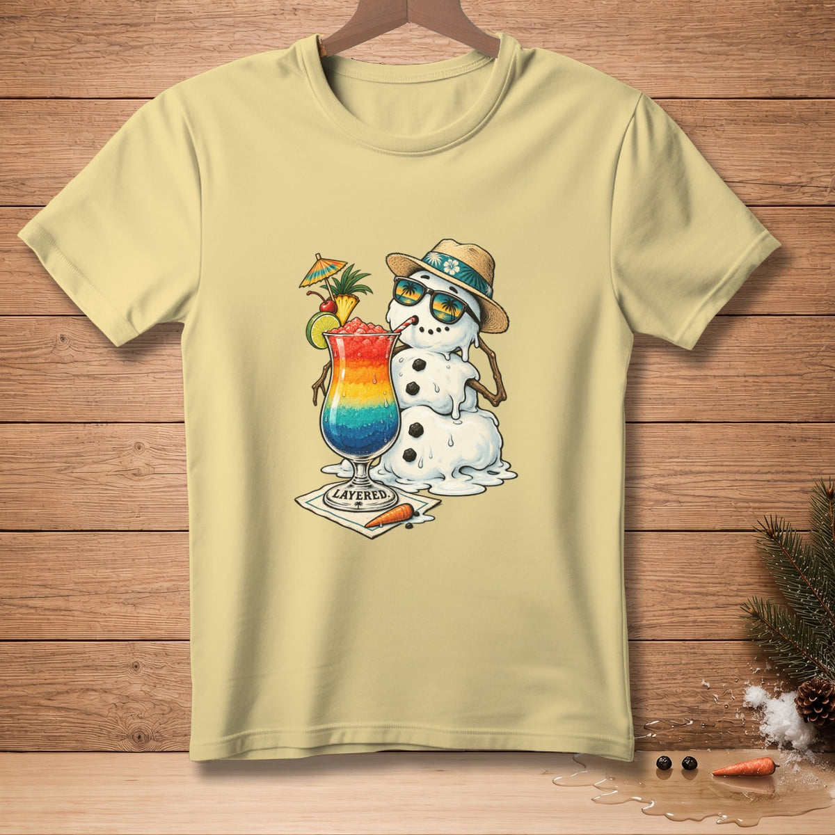 Melting snowman in sunglasses and hat holding rainbow drink with text "LAYERED."
