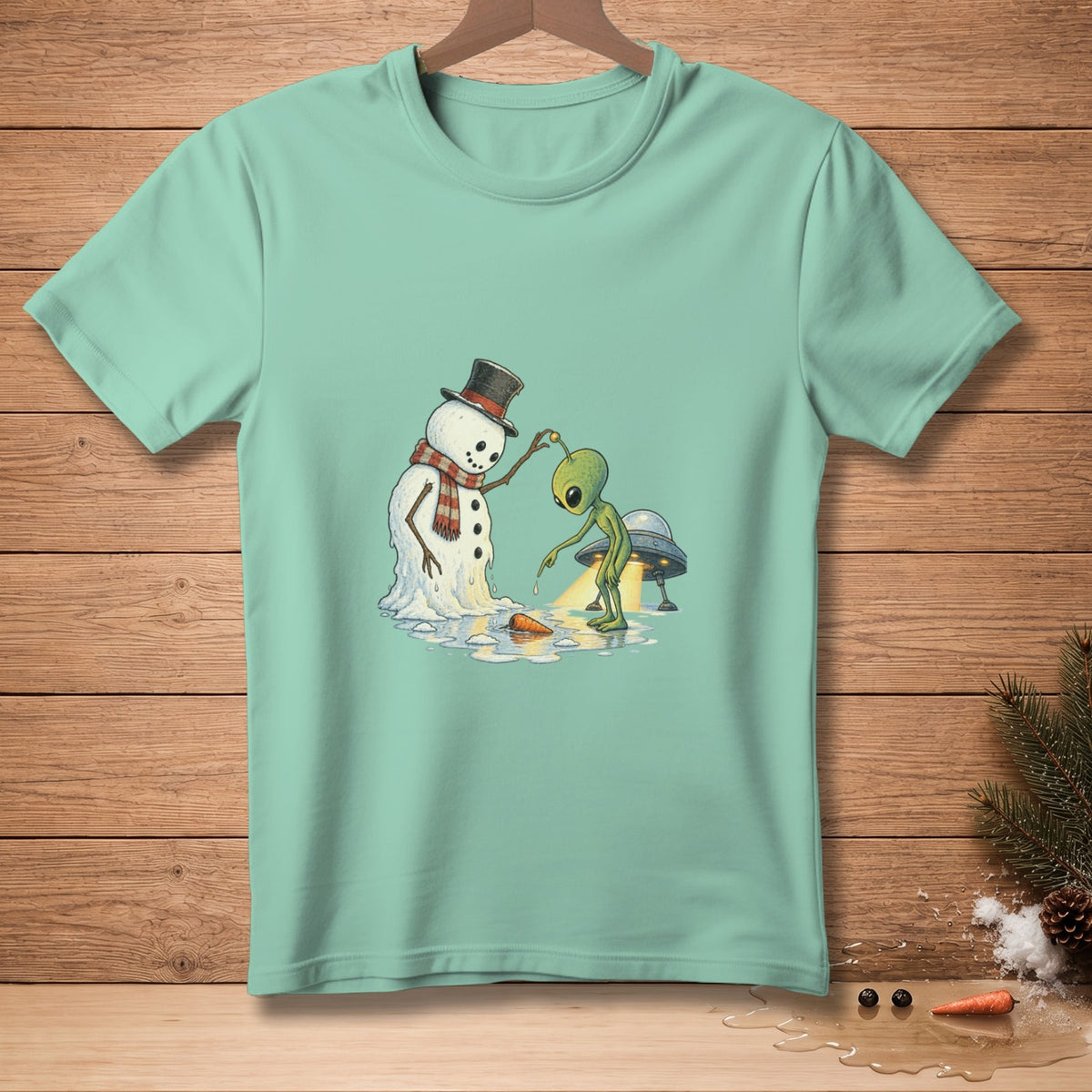 Snowman with top hat and scarf melts as alien interacts with carrot and UFO.