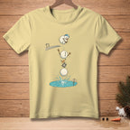 Yellow t-shirt with cartoon snowman falling into water, with a "Good Luck" sign.