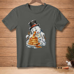 Melting snowman with carrot nose eating pancakes on a plate.