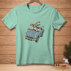 Snowmen wearing scarves and hats drive a blue convertible with "TOP DOWN" license plate.