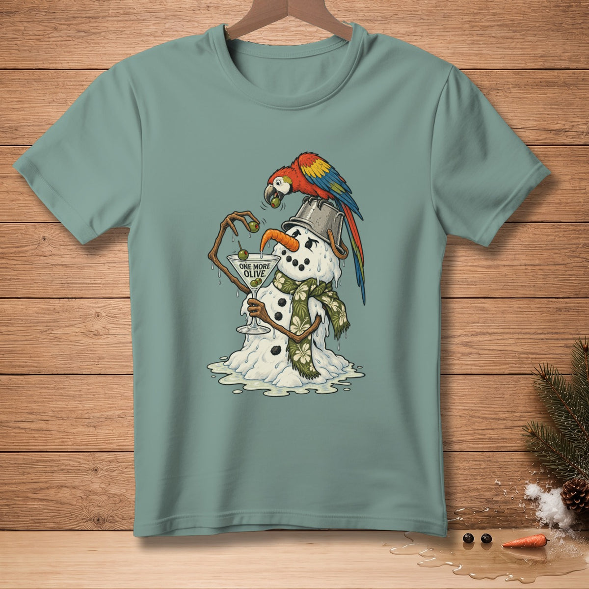 Melting snowman with parrot on bucket hat holds martini with "One More Olive" text.