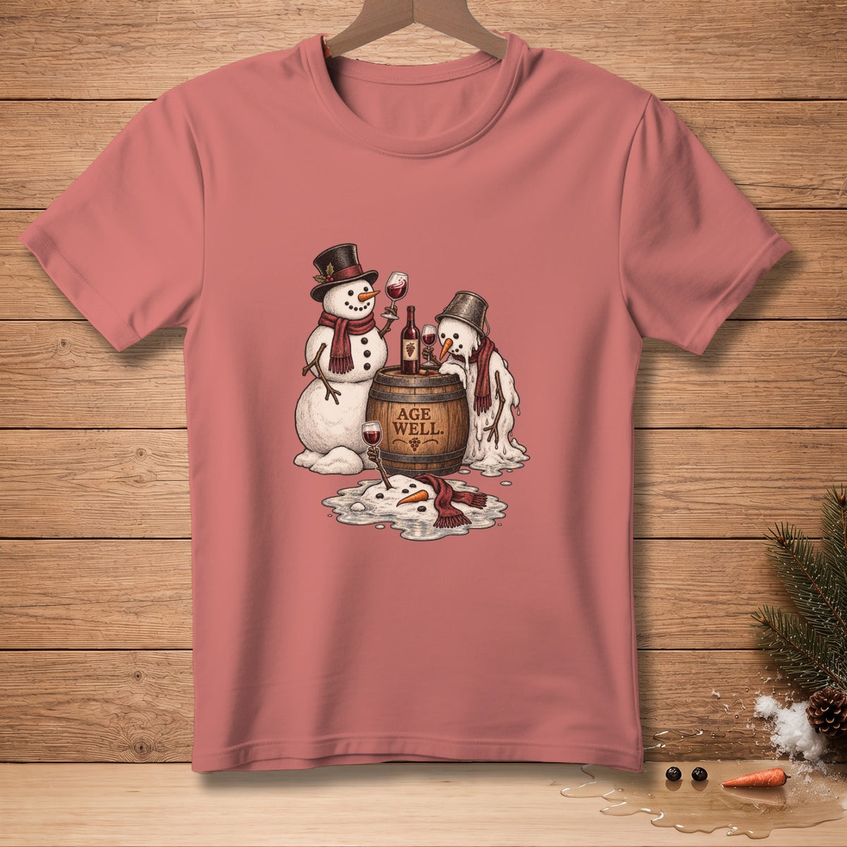 Two snowmen, one melting, share wine from a barrel labeled "Age Well."
