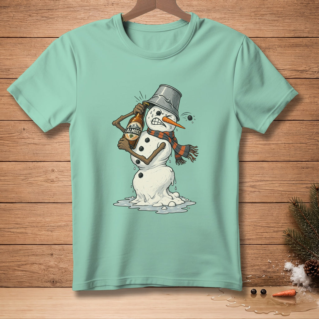 Mint green t-shirt with a melting snowman wearing a bucket hat and scarf, drinking beer.