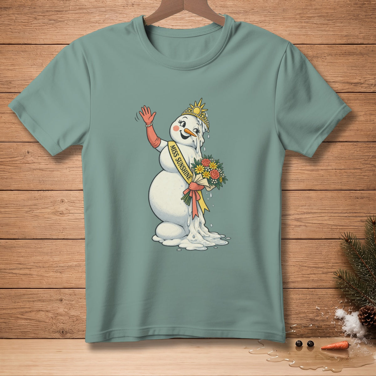 Melting snowman wearing crown, sash labeled "Miss Sunshine," and holding flowers.