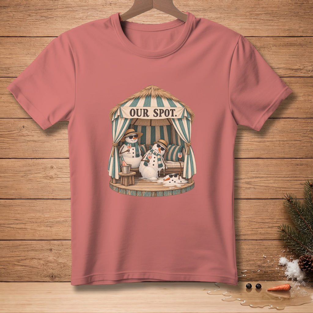 T-shirt graphic with snowmen under a cabana, text reads "OUR SPOT."