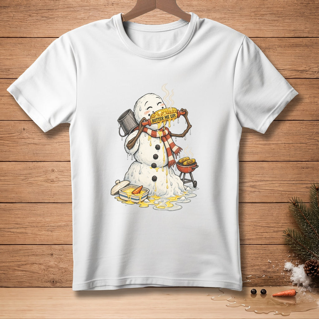 White t-shirt with illustration of melting snowman eating corn on the cob labeled "Butter Me Up."