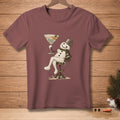 Snowman holding martini with "Shaken, Obviously" text, on a maroon t-shirt.