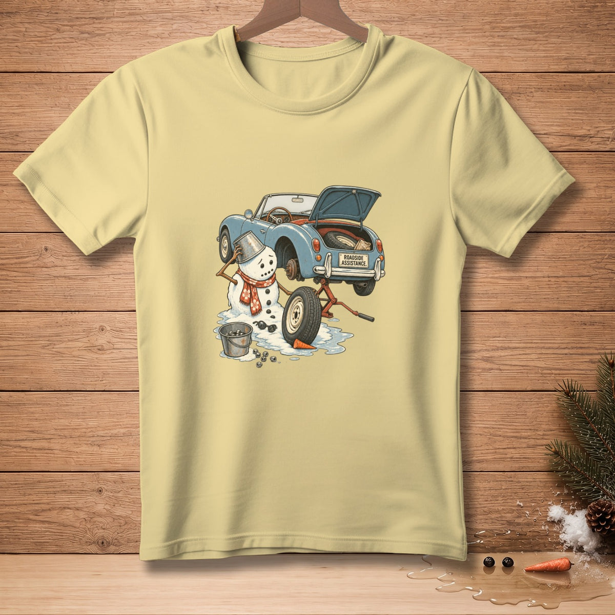 Snowman with bucket head changing tire on blue car with "Roadside Assistance" on back.