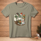 Snowmen gardening with flowers, water, and a shovel on a light brown t-shirt.