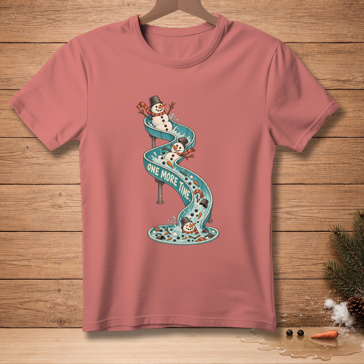 T-shirt with snowmen sliding down a water slide, text "ONE MORE TIME."