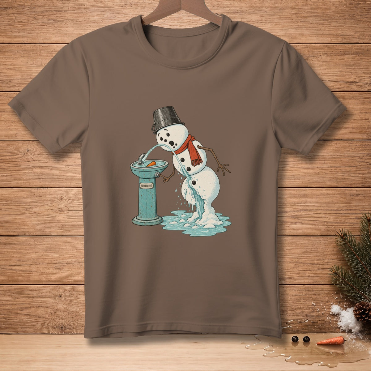 T-shirt graphic of a melting snowman drinking from a "Refreshing" water fountain.