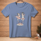 Three snowmen in ballet tutus perform on a blue t-shirt with "Swan Lake" text.