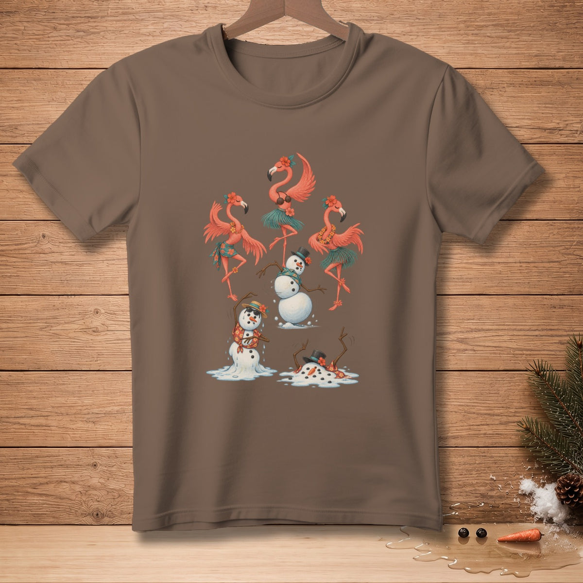 Brown t-shirt with cartoon flamingos and melting snowmen graphic.